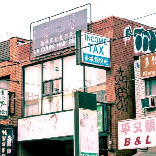 A group of shop signs in Toronto's chinatown.